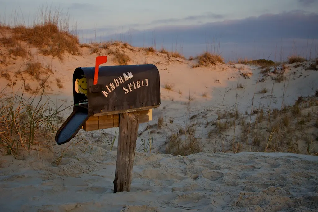 The Kindred Spirit mailbox standing in the dunes on Bird Island